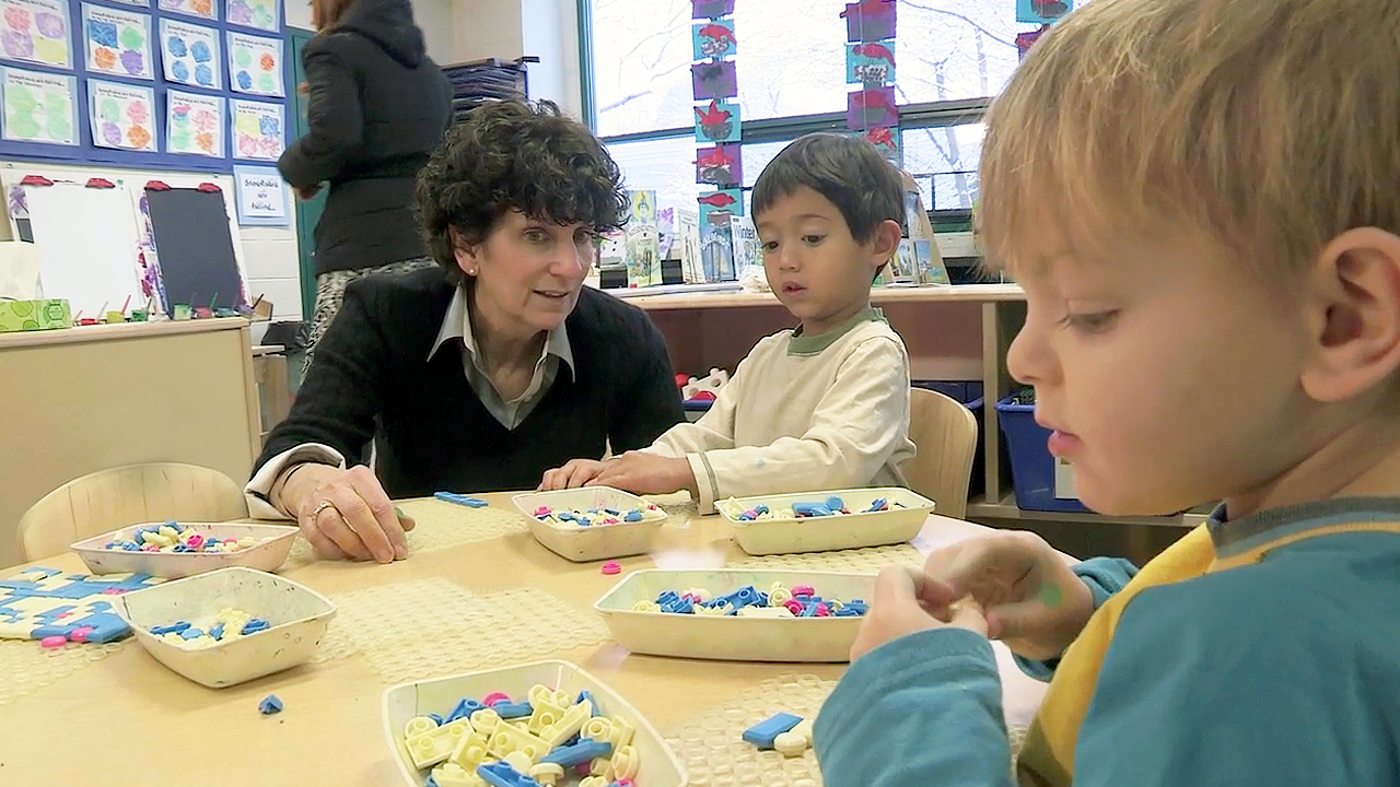 kindergarten students talking to each other